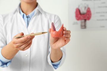 What is parathyroid hormone, hyperparathyroidism, and why is it dangerous for dialysis patients?